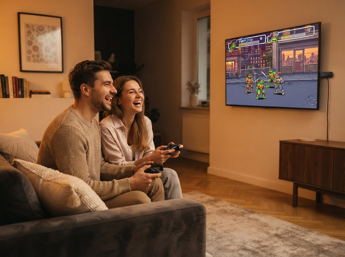 A couple playing retro video games on a modern TV in a cozy living room with a wireless console stick plugged in.